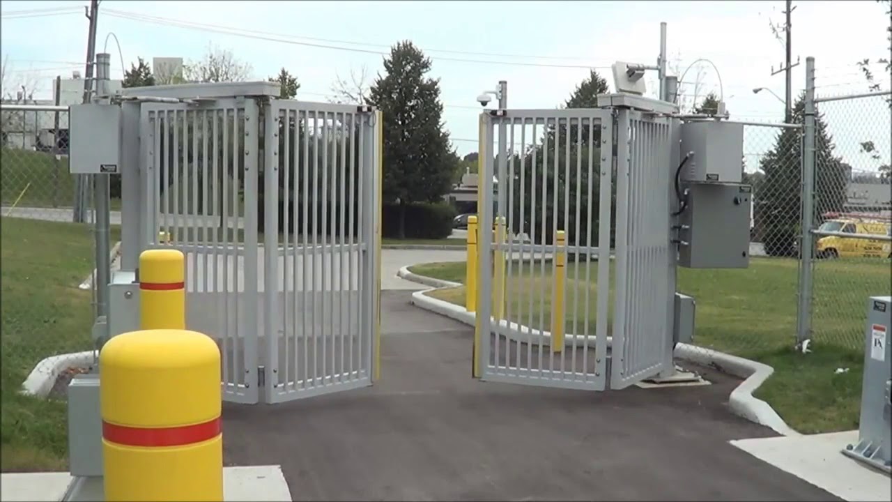 Four-Fold security gate: Trackless folding gate system for perimeter  security access
