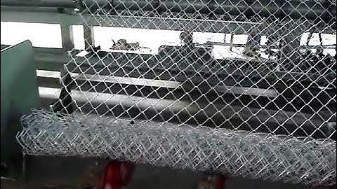 Fully automatic chain link fence machine
