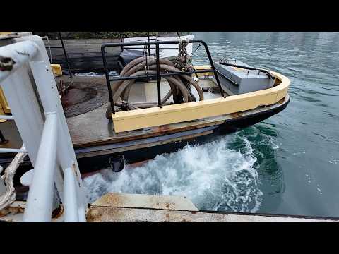 The Lower Ferry leaving from Kingswear U.K. and arriving at Dartmouth on a misty morning