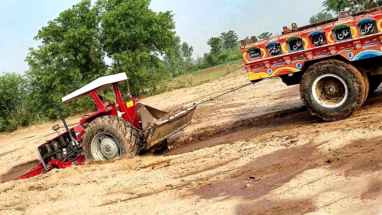 Massey Ferguson 385 Tractor Stuck in mud/Front wheel stuck in mud