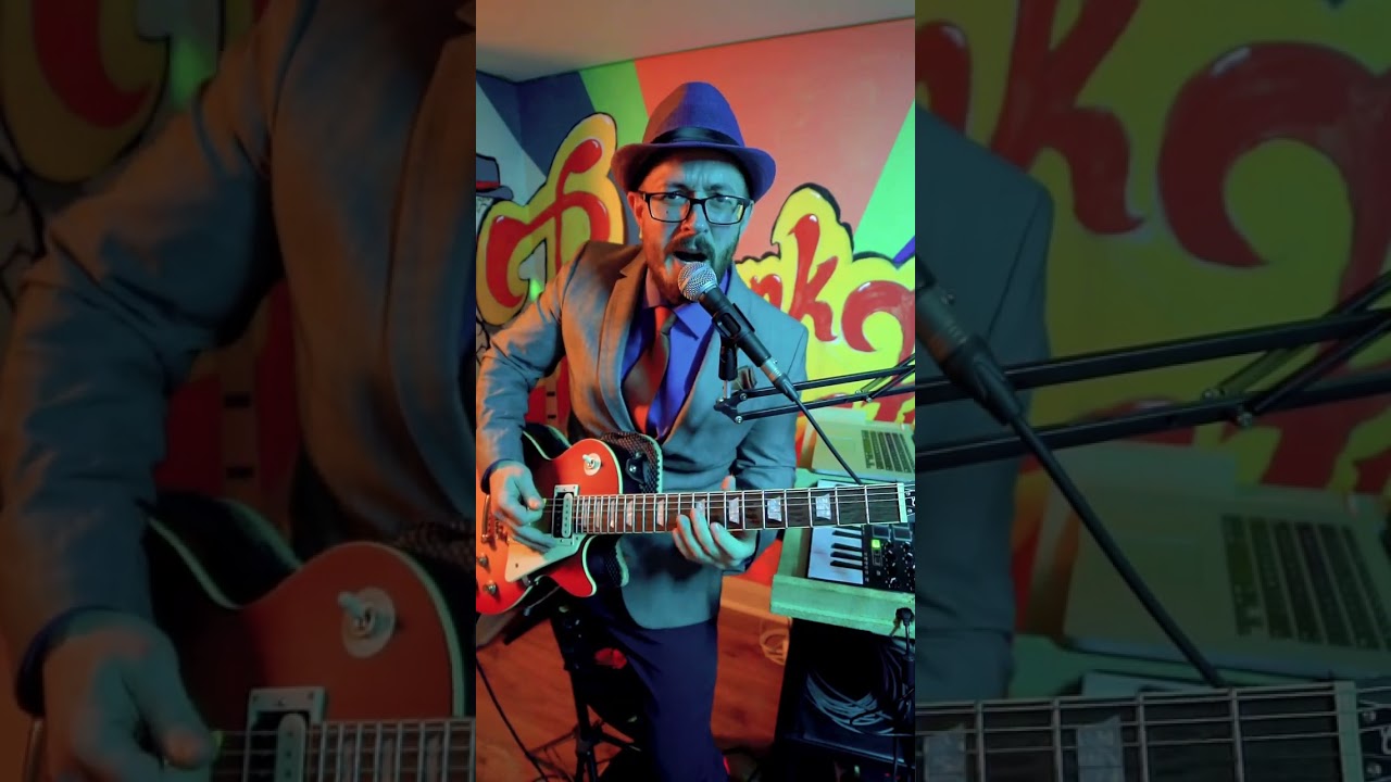 Guitar Slamming Holiday Greeting from Badunk a Funk a.k.a. Craig F. Watkins