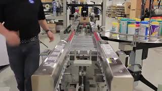 Wear Bel Form Pack And Seal System With Hold Down Conveyor