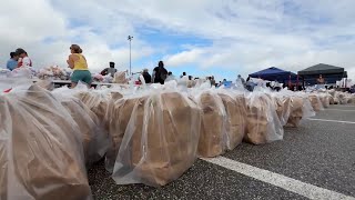 Volunteers rally at Daytona International Speedway for SNAP food drive