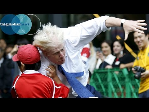 Boris Johnson knocks over boy in rugby match