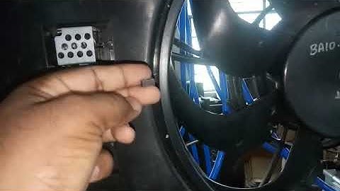 Automotive radiator cooling fan assembly balancing machine