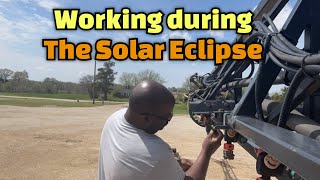 Finishing up the 4710 sprayer during the solar eclipse