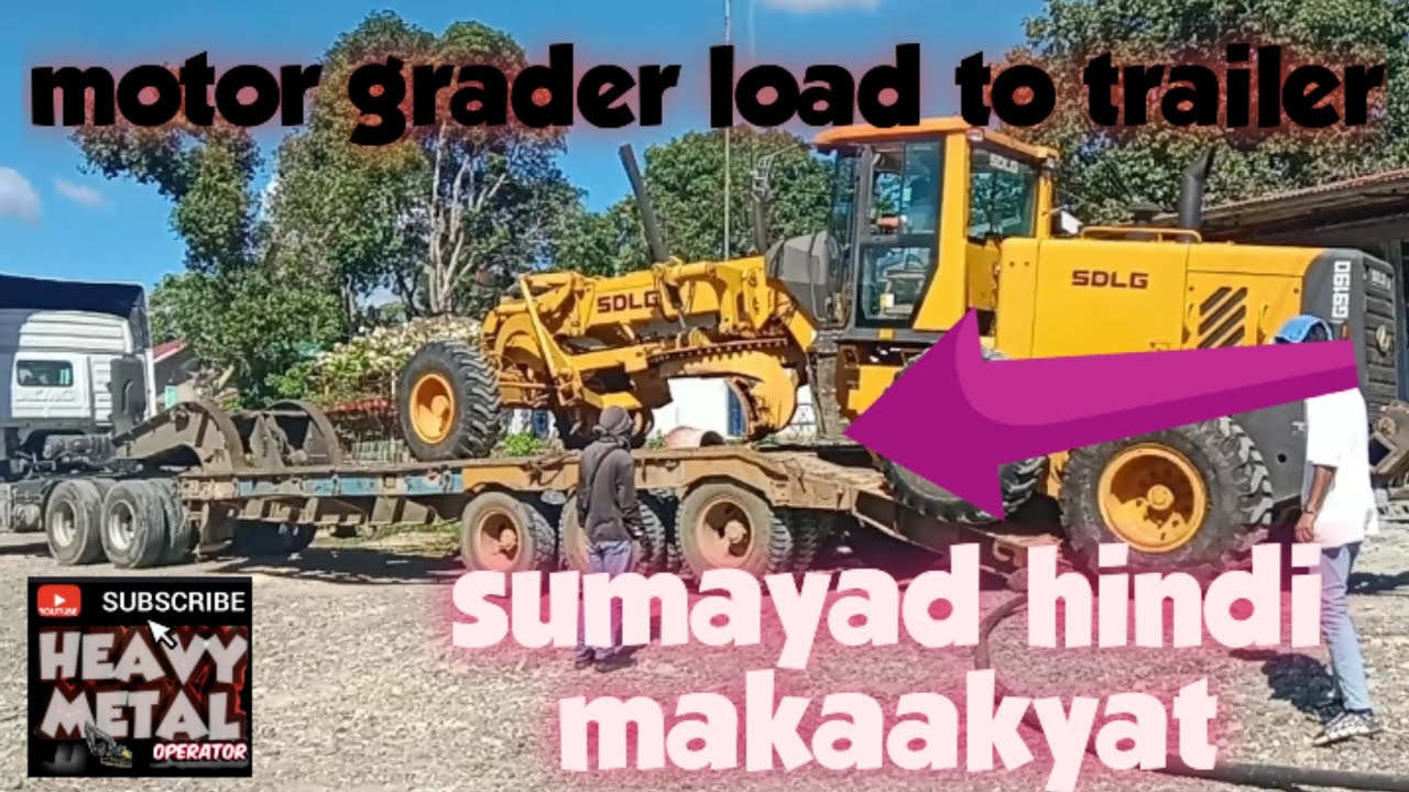 motor grader load to trailer, sumayad hindi makaakyat