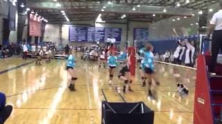 Kayla Simmons #9, 5'9" left handed setter, 2014 grad