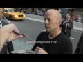 Bruce Willis - Signing Autographs at the 'Red 2' premiere in NYC