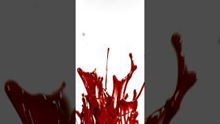 Abstract Red Liquid Explosion In Slow Motion Against White Backdrop
