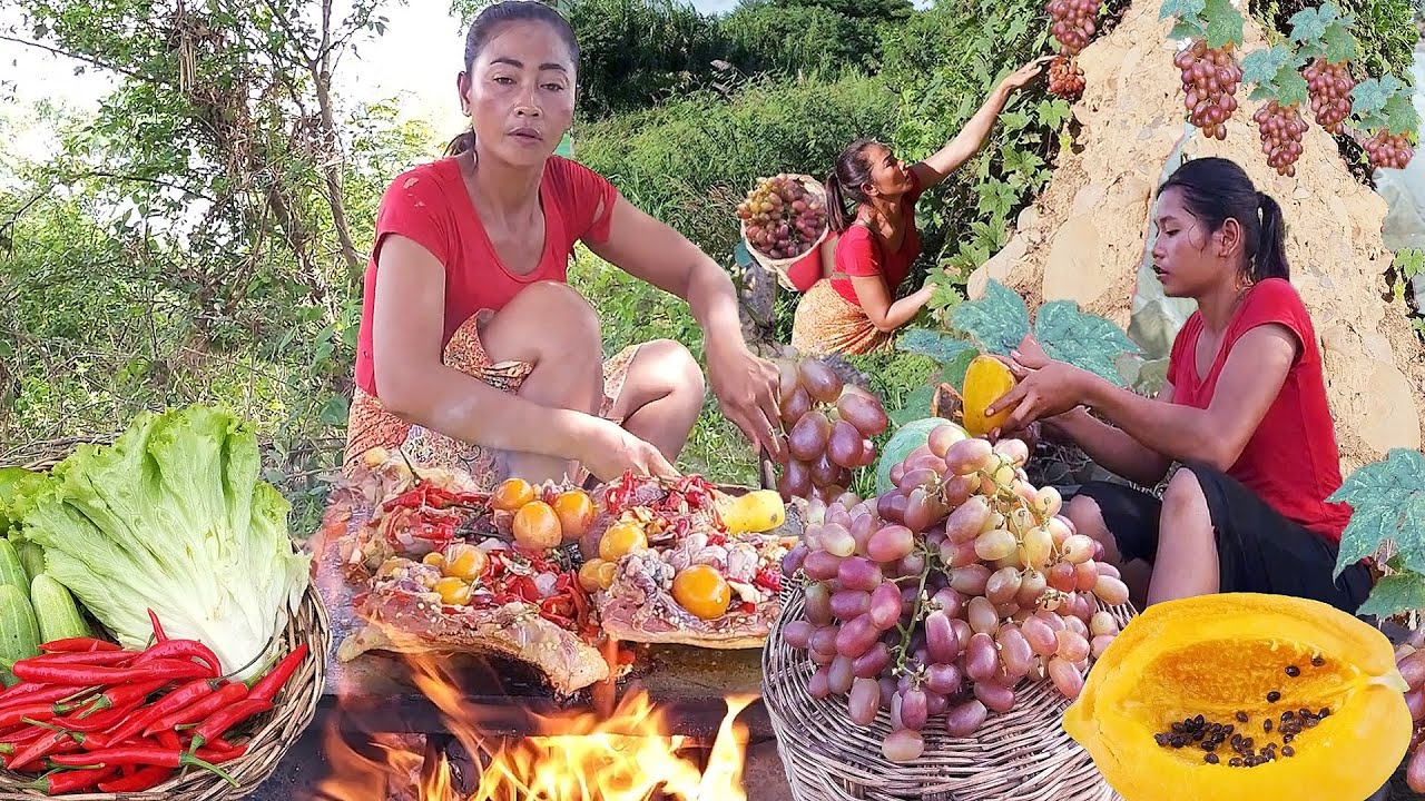 Life in jungle, Found natural fruit for food of survival, Chicken and egg grilled on rock for dinner