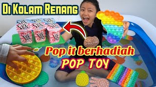 POP IT CHALLENGE IN THE SWIMMING POOL! Prizes include a POP TOY! The penalty is to throw the Pop ...