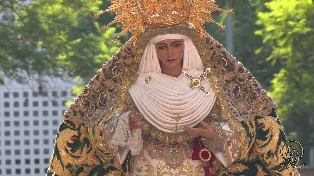 La calle Getsemaní, en el Polígono Sur de Sevilla, se inundó de Esperanza. Esperanza de Triana