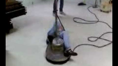 Riding a floor buffer!