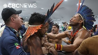 Thumbnail for Indigenous activists storm UN climate summit in Brazil, demanding action