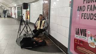 Accordion Player at the Oxford Circus Station London