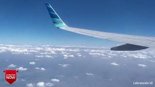 MENIKMATI PEMANDANGAN AWAN DARI JENDELA PESAWAT GARUDA INDONESIA
