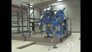 Dynamical Balance of a Humanoid Robot by Grasping a Handrail -2004-