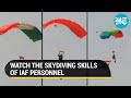 Watch iafs akash ganga team displays skydiving skills at defence ministry event in jhansi