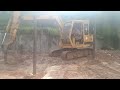 Excavator leveling dirt soils