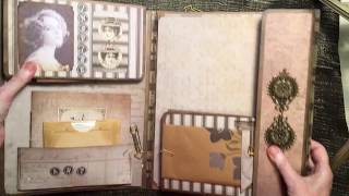 Traveling art compendium Tim Holtz folder base.