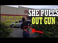 Woman pulls gun on guy filming on sidewalk