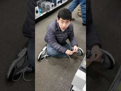 #005 trying to tie the shoelaces
