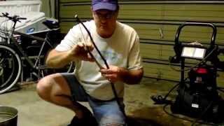 Trying to make fire with a bow and drill