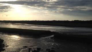Time lapse tide coming in and sunset at Ocean Isle Beach, NC