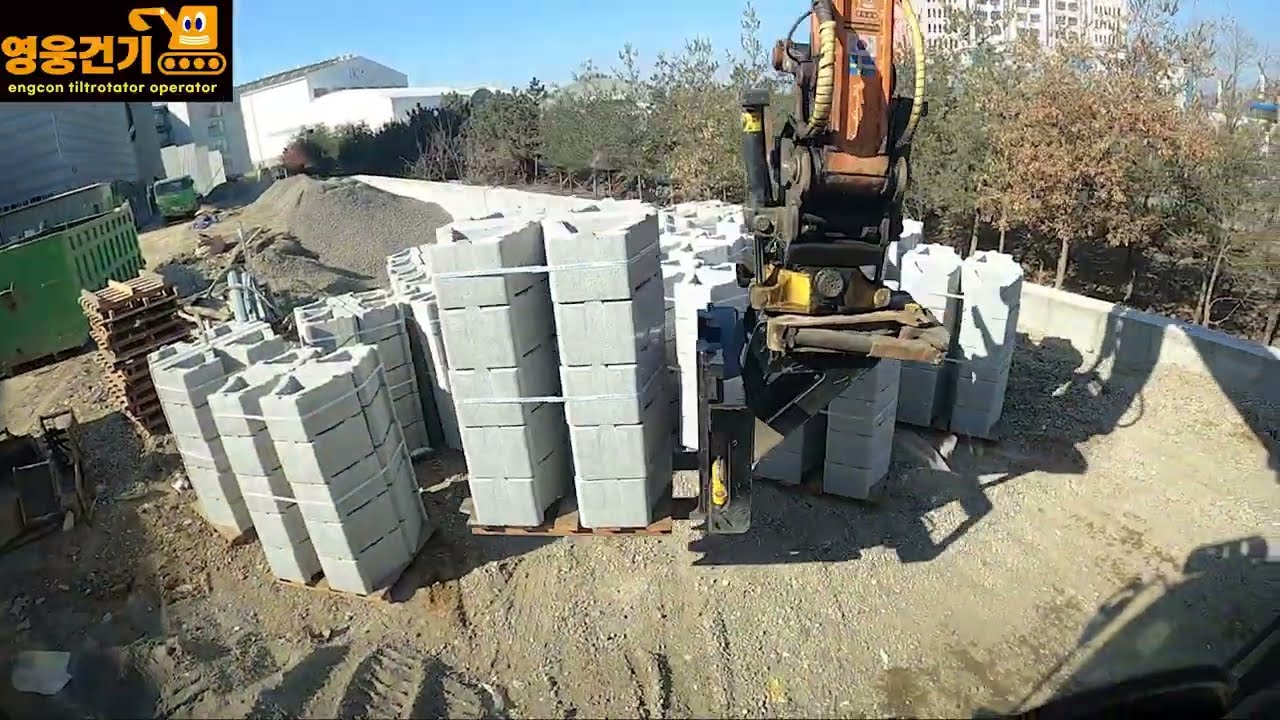 영웅건기 엥콘틸트로테이터(engcon tiltrotator)활용 보강토블럭 작업.