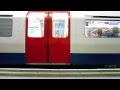 Train arriving at Earls Court Underground station