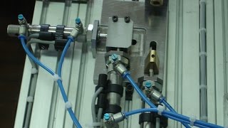 Mechanical Assembly Simulating A Lathe Controlled By Plc
