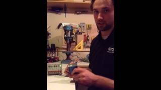 Mr. Janson (mechanical engineer) explains sensors to team 3740