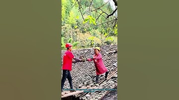 Roof Tiles Removal: Team Working on Old Roof