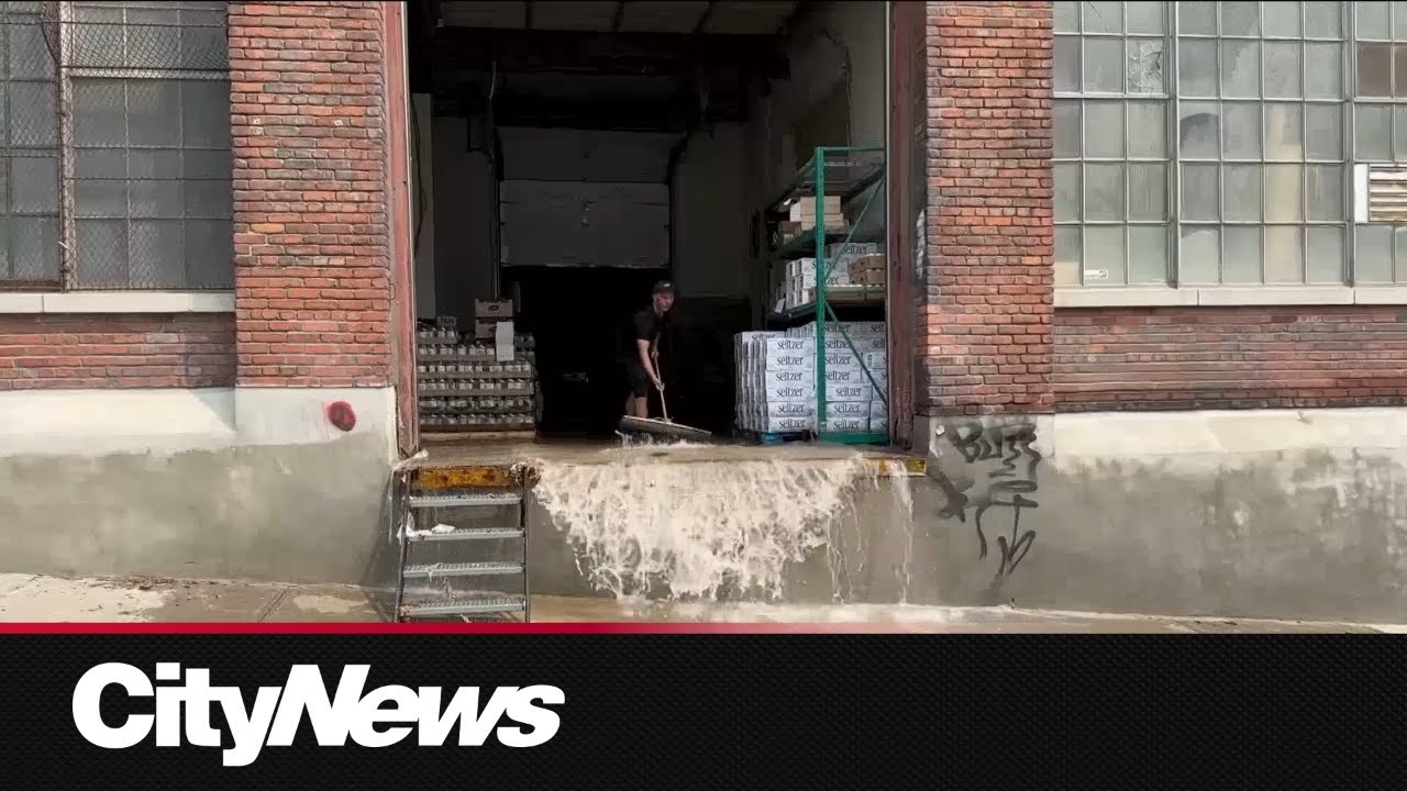 Major water main break floods homes and businesses in Montreal - YouTube