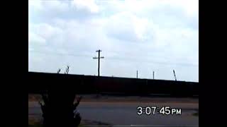 UP 7090 leading empty coal train west leaving Grand Island 
