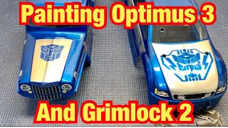 Painting Optimus 3 and Grimlock 2 bodies