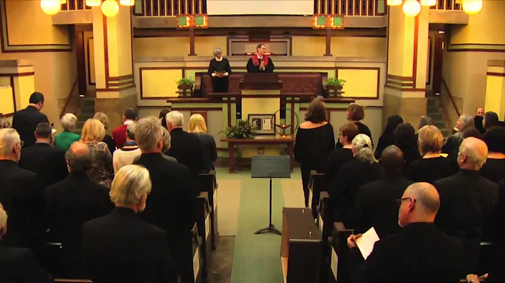 Rev. Alan Taylor opens the memorial service of Gre...