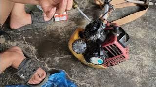 Talented repair girl, helping her neighbor repair and replace the lawnmower mechanism#trieuthithiet