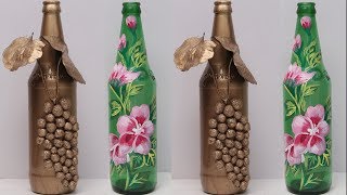 Diy waste glass crafts.waste bottle decoration materials required :
wine bottles, acrylic paints, spray paint, tissue paper, leaves of
plastic flowers....