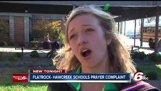 School criticized for allowing prayer at events, students pray in response