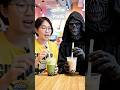 Pratik is enjoying a delicious bubble tea with a spooky ghost character! 👻🧋