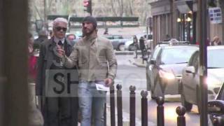 Karl Lagerfeld walking in the streets of Paris
