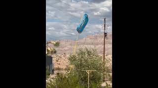 Inflatable Pool Blows Onto Power Lines Then Drops To Ground