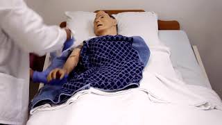 Gives Modified Bed Bath (Face And One Arm, Hand and Underarm)