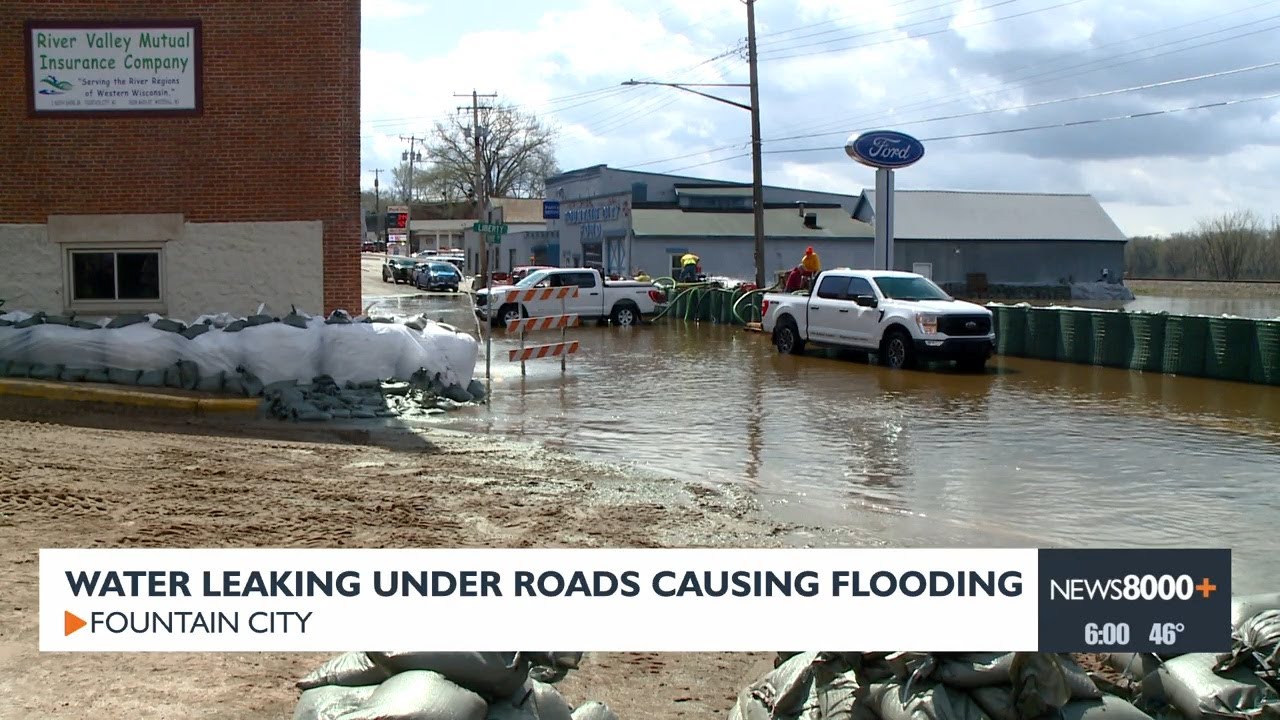 Water seeps through road, causes flooding in Fountain City YouTube