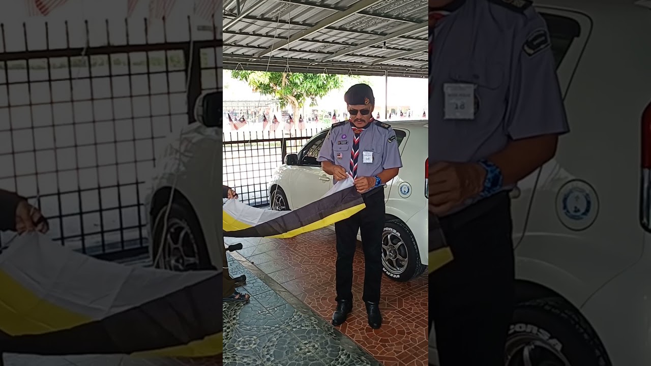 MELIPAT DAN MENGIBAR BENDERA