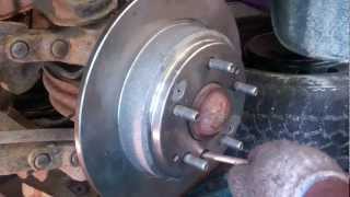Releasing safety brake to change a rear rotor
