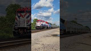 Metra 525 wearing the America 250th paint scheme heads West through Elgin with train 2235