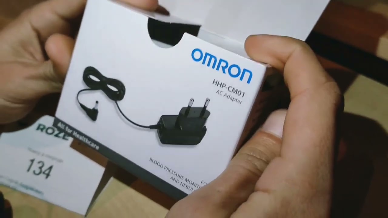 Розпакування "Блок питания OMRON HHP-CM01 (9546045-8)" з Rozetka